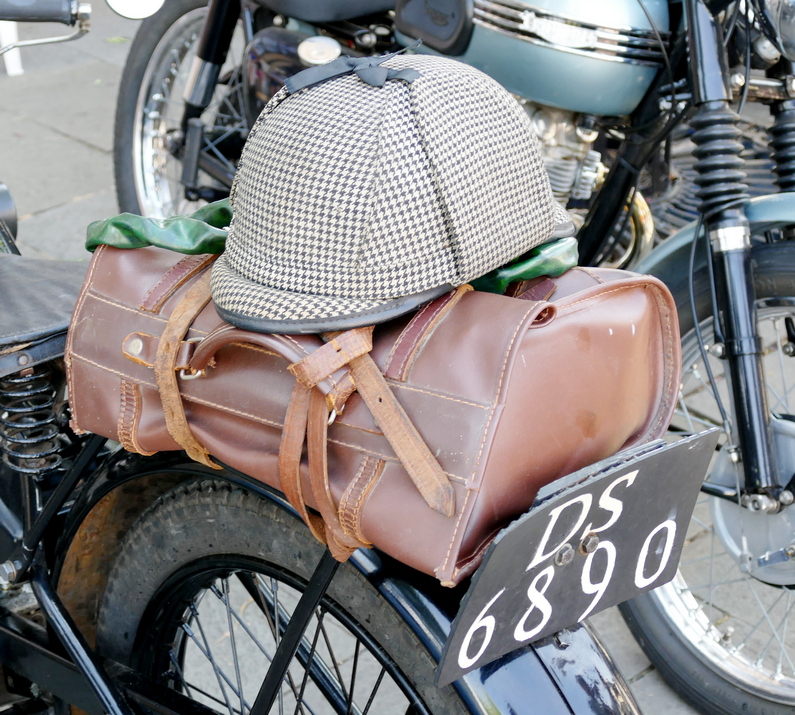 Quintessentially British - A Deerstalker hat and a Gladstone bag