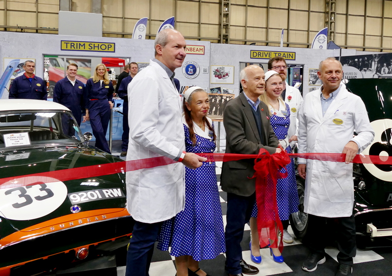 Lord Rootes cutting the ribbon on the Sunbeam Alpine stand which won the "Best Large Stand" at the show