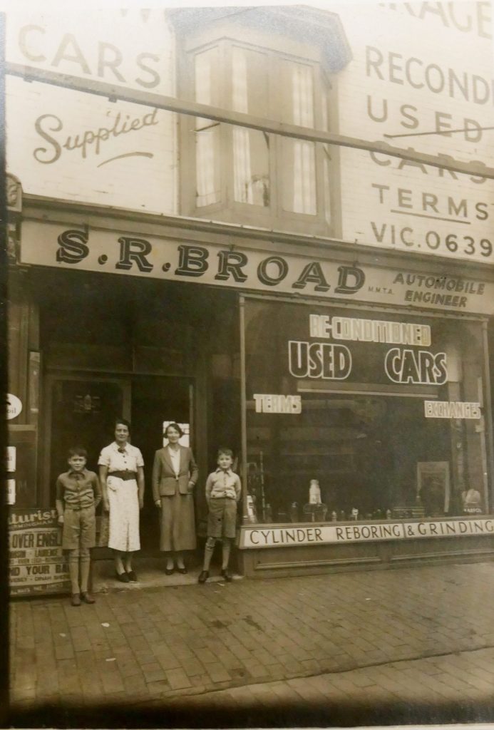 Ralph (LHS) and Eric (RHS) with their mother (next to Ralph) outside the family Garage on the Stratford Rd., Sparkbrook, Birmingham.