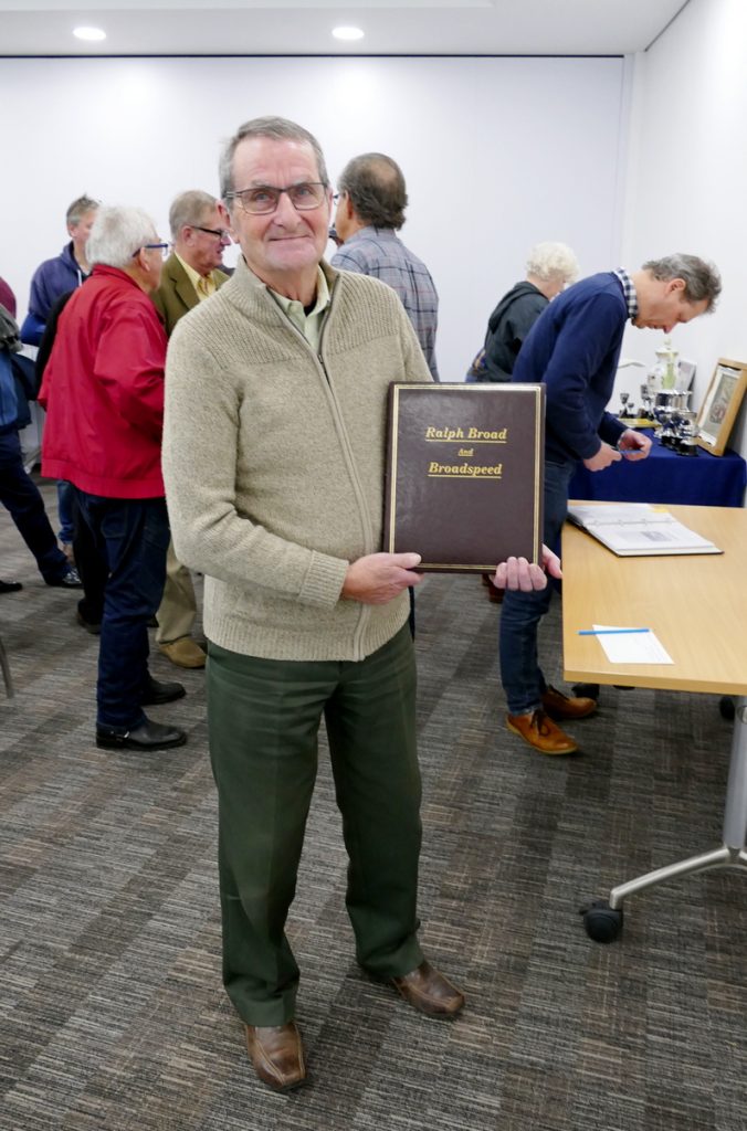 David Harris holding one of the two volumes of Ralph Broad's Biography.